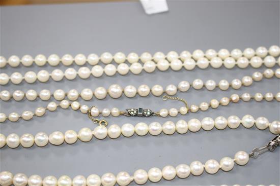 Seven assorted single strand cultured pearl necklaces, three with 925 clasps, two with 935 or 835 clasps and two others